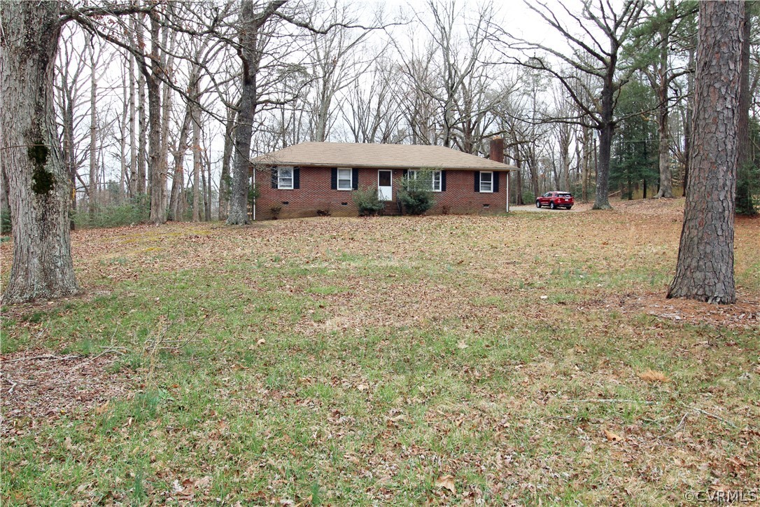12821 Old Buckingham Road Midlothian, VA 23113 - Photo 49 of 50 a front view of a house with a yard