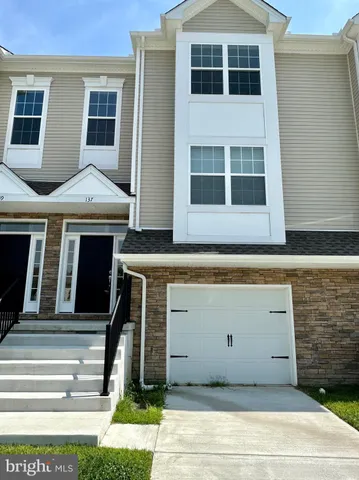 a front view of a house with windows