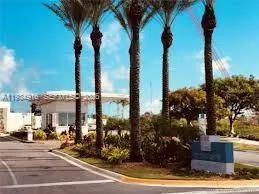 a view of a house with a fountain
