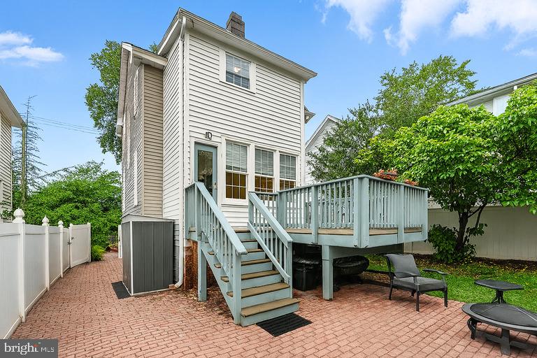 3921 22nd Street Northeast Washington, DC 20018 - Photo 24 of 28 a view of a house with a deck and furniture
