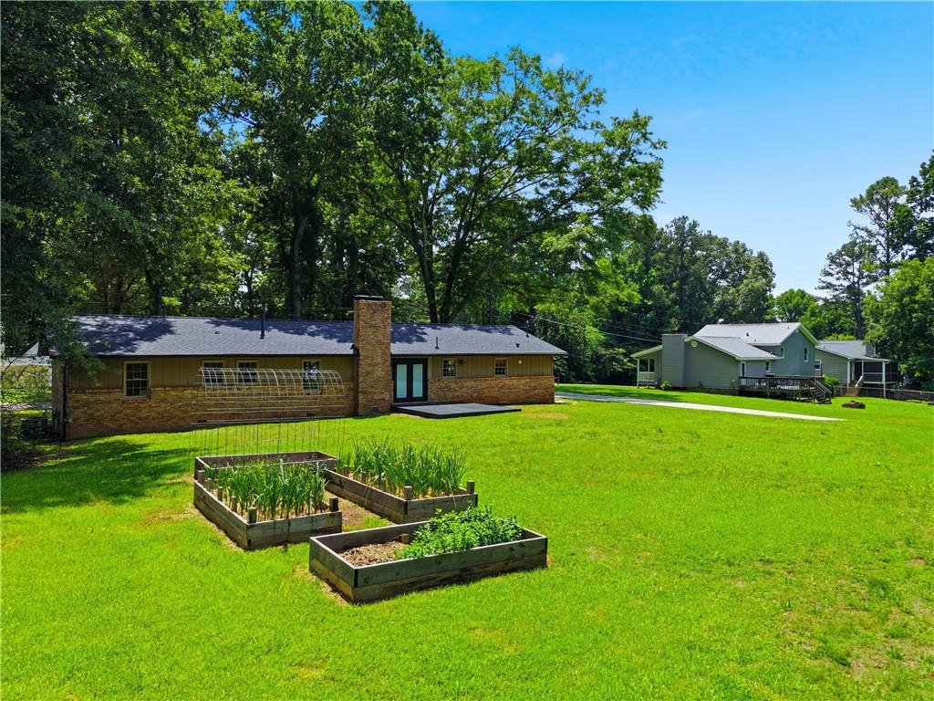 125 Childers Road Canton, GA 30115 - Photo 45 of 48 a view of a backyard with sitting area