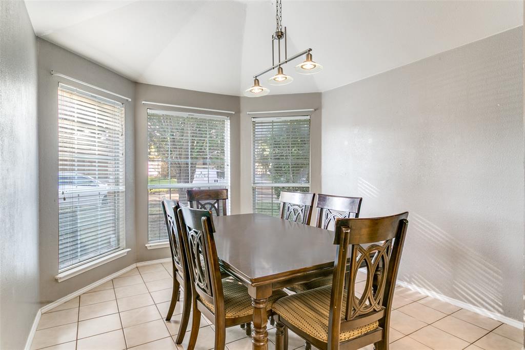 2408 Graystone Lane Corinth, TX 76210 - Photo 7 of 17 a view of a dining room with furniture window and outside view