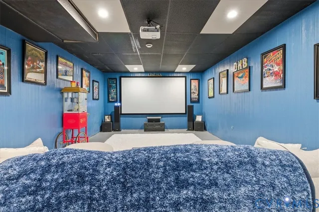 a bedroom with bed and a flat screen tv