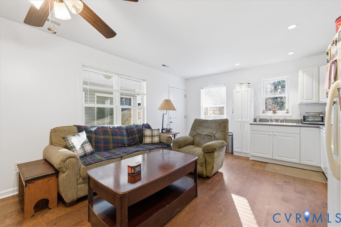 13504 Taylor Drive Disputanta, VA 23842 - Photo 21 of 49 a living room with furniture and a large window