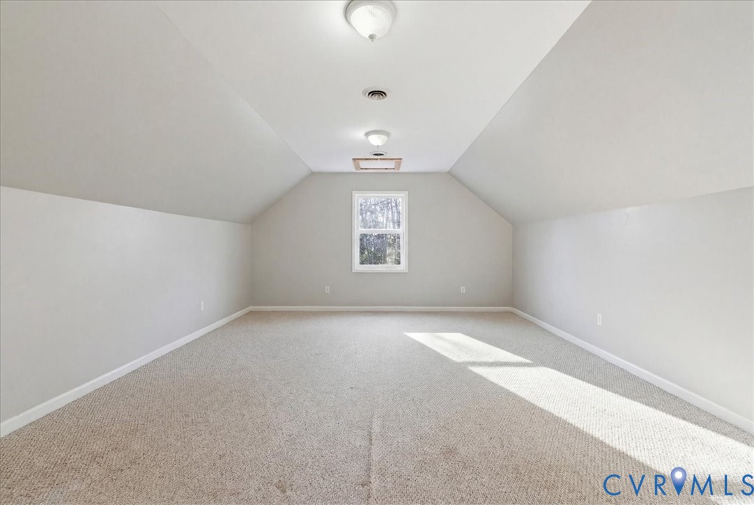13504 Taylor Drive Disputanta, VA 23842 - Photo 27 of 49 wooden floor in an empty room with a window