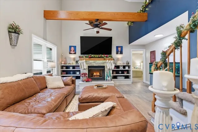 a kitchen with granite countertop white cabinets white stainless steel appliances and sink