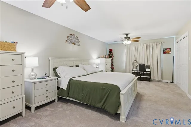 a white bath tub sitting in a bathroom next to a window