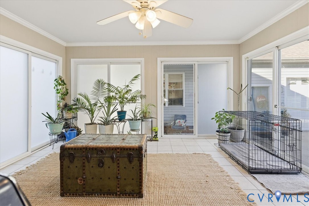 13504 Taylor Drive Disputanta, VA 23842 - Photo 43 of 49 a living room with furniture and a potted plant