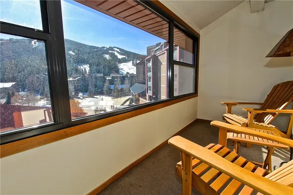 a view of a living room with a large window
