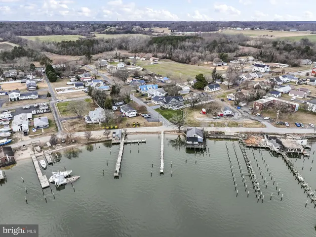 a view of a balcony with wooden floor