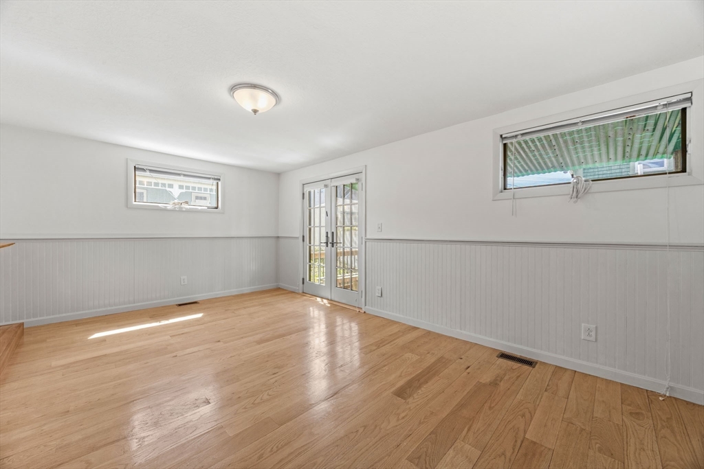 7 Grove Street Wareham, MA 02558 - Photo 15 of 41 a view of a big room with wooden floor and windows