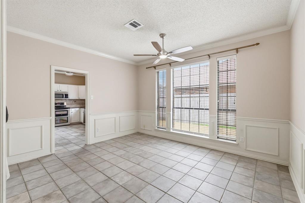 605 Andover Lane Coppell, TX 75019 - Photo 18 of 39 a view of an empty room with a window