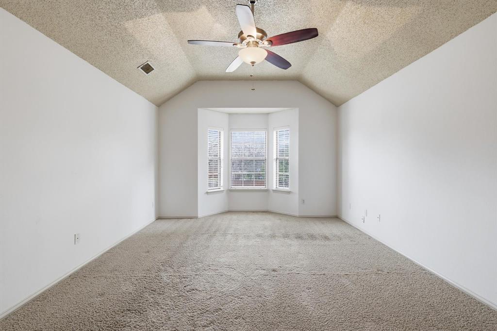 605 Andover Lane Coppell, TX 75019 - Photo 21 of 39 a view of an empty room with a window