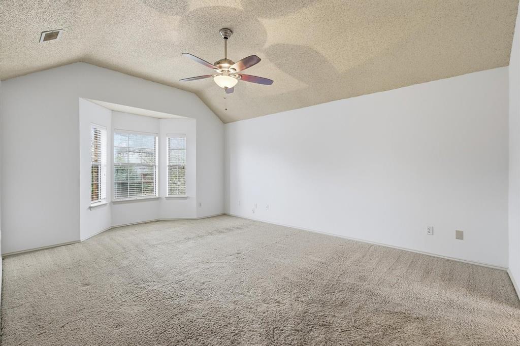 605 Andover Lane Coppell, TX 75019 - Photo 22 of 39 a view of an empty room with a window