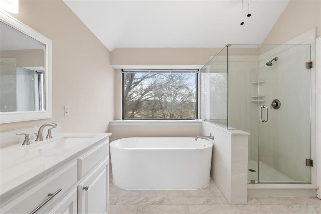 605 Andover Lane Coppell, TX 75019 - Photo 23 of 39 a white bath tub sitting next to a white sink