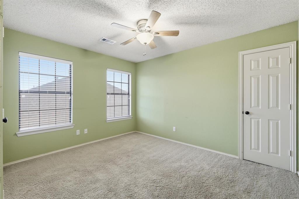 605 Andover Lane Coppell, TX 75019 - Photo 25 of 39 a view of an empty room with a window