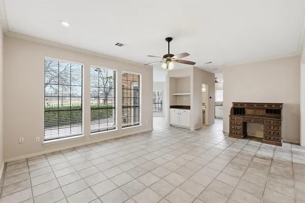 a view of kitchen with furniture and window