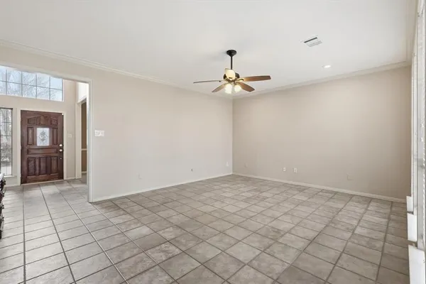 a view of an empty room and window