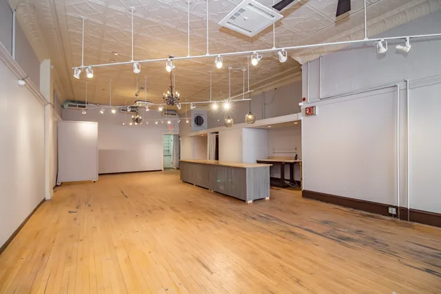 a view of a terrace with sitting area