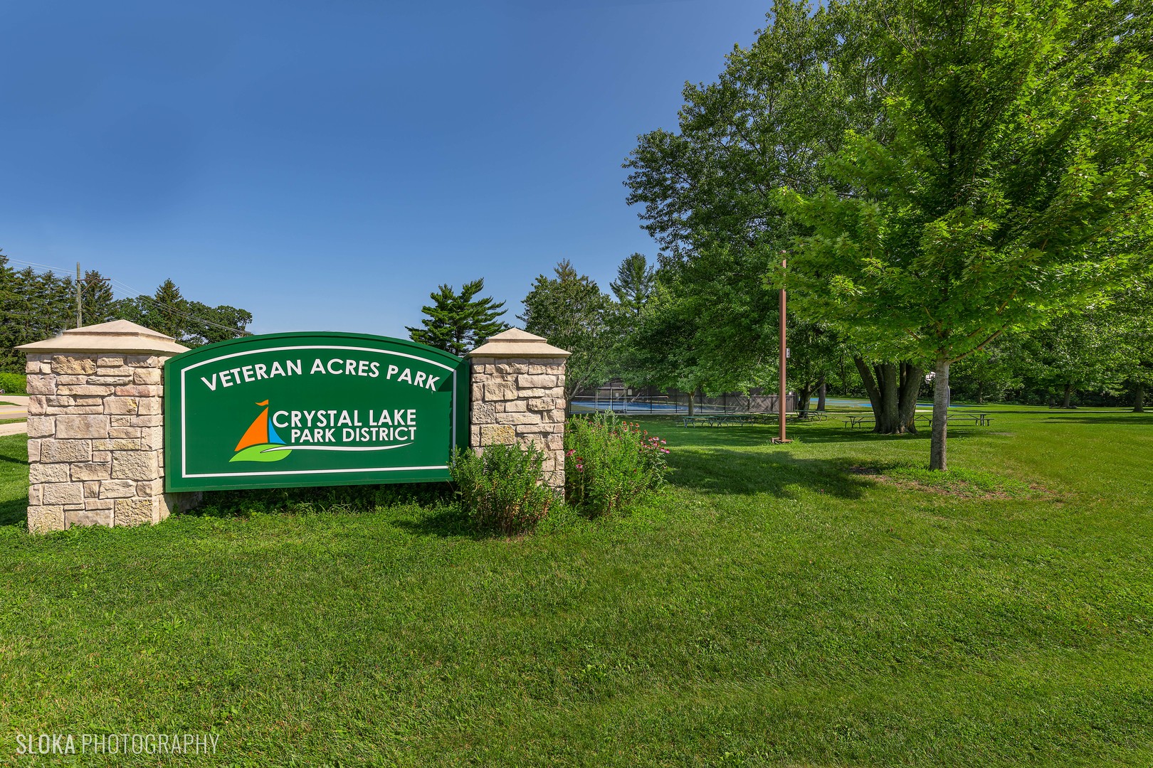 71 North Williams Street Crystal Lake, IL 60014 - Photo 42 of 42 a view of a park with welcome board