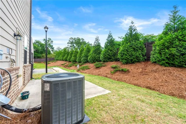 a view of a backyard with plants