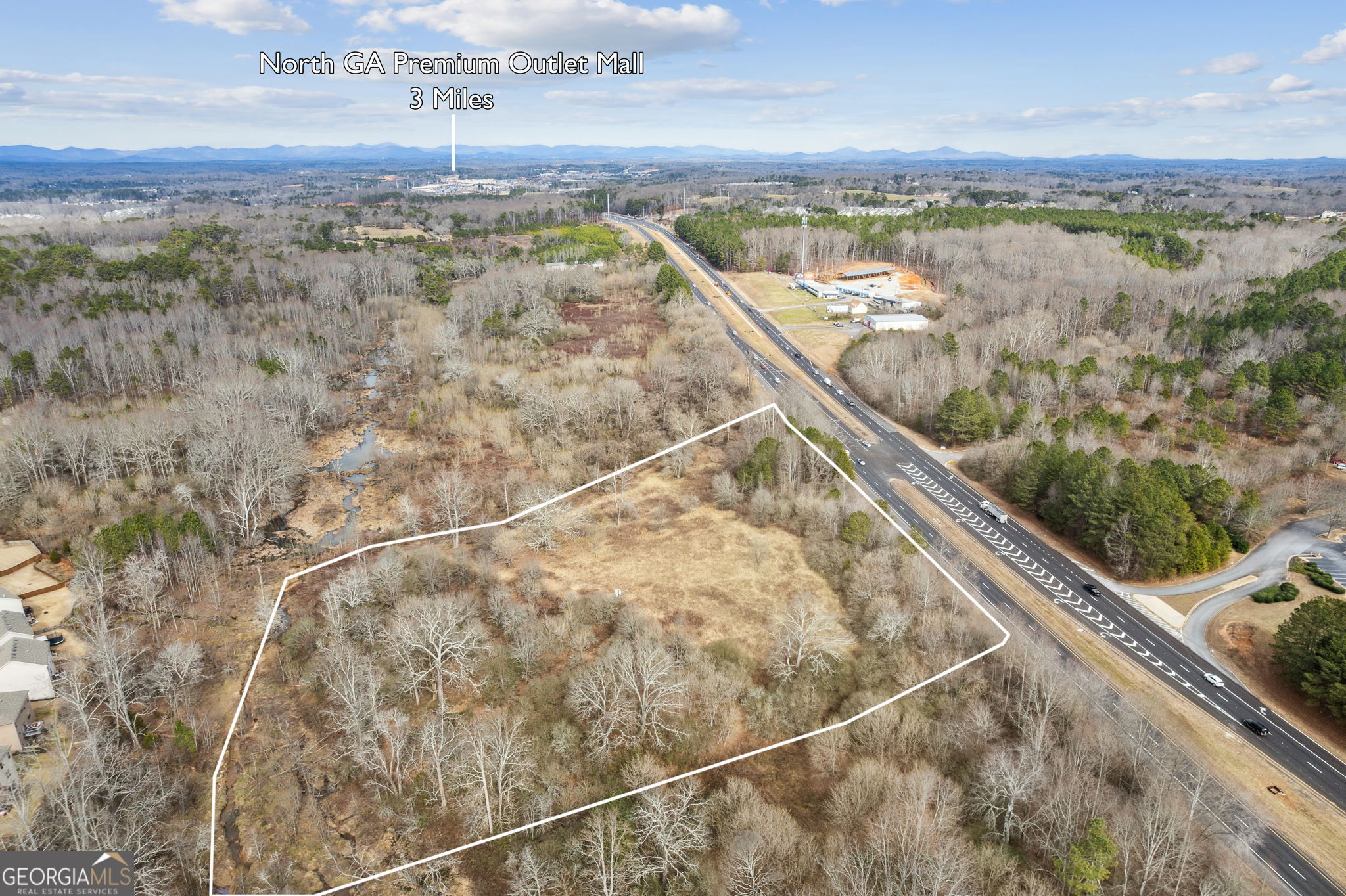 0 Ga Highway 400 Cumming, GA 30041 - Photo 1 of 1 a view of a lake from a balcony