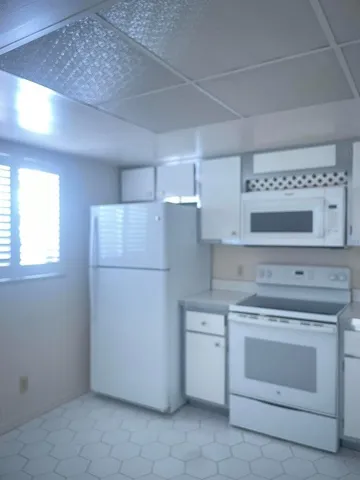 a view of a storage & utility room with washer and dryer
