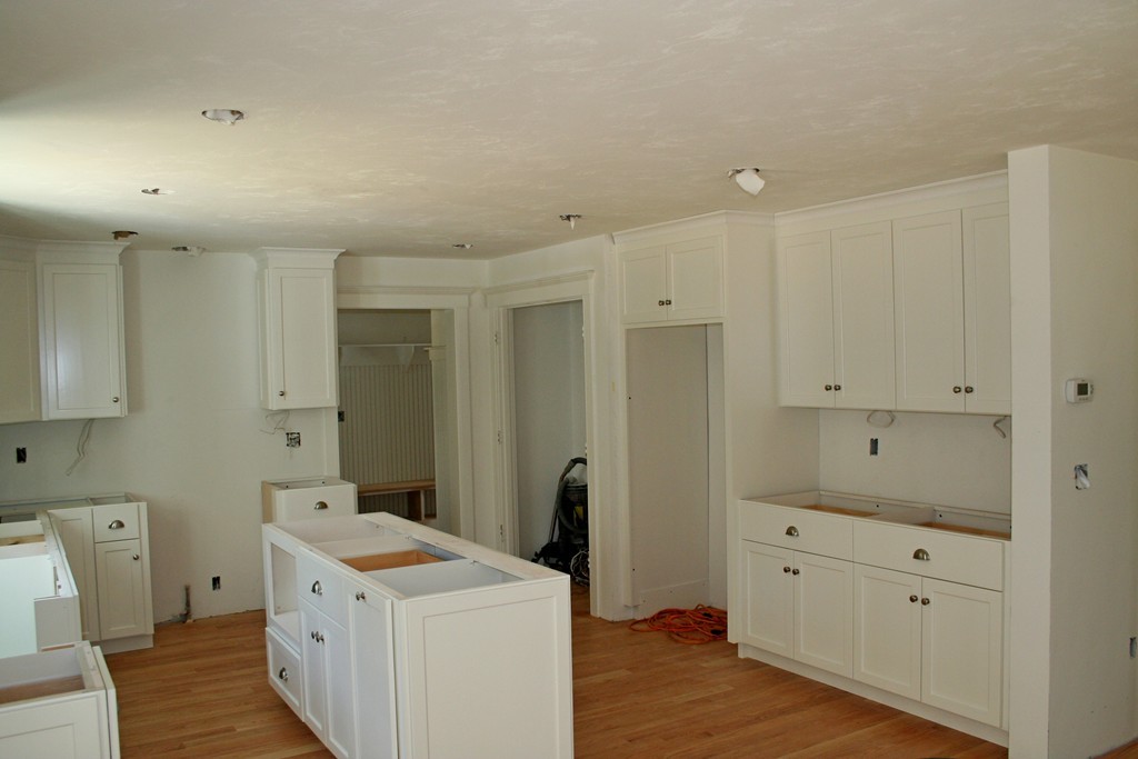 90 Pine Ridge Road Brewster, MA 02631 - Photo 5 of 11 a view of a storage & utility room with closet wooden floor