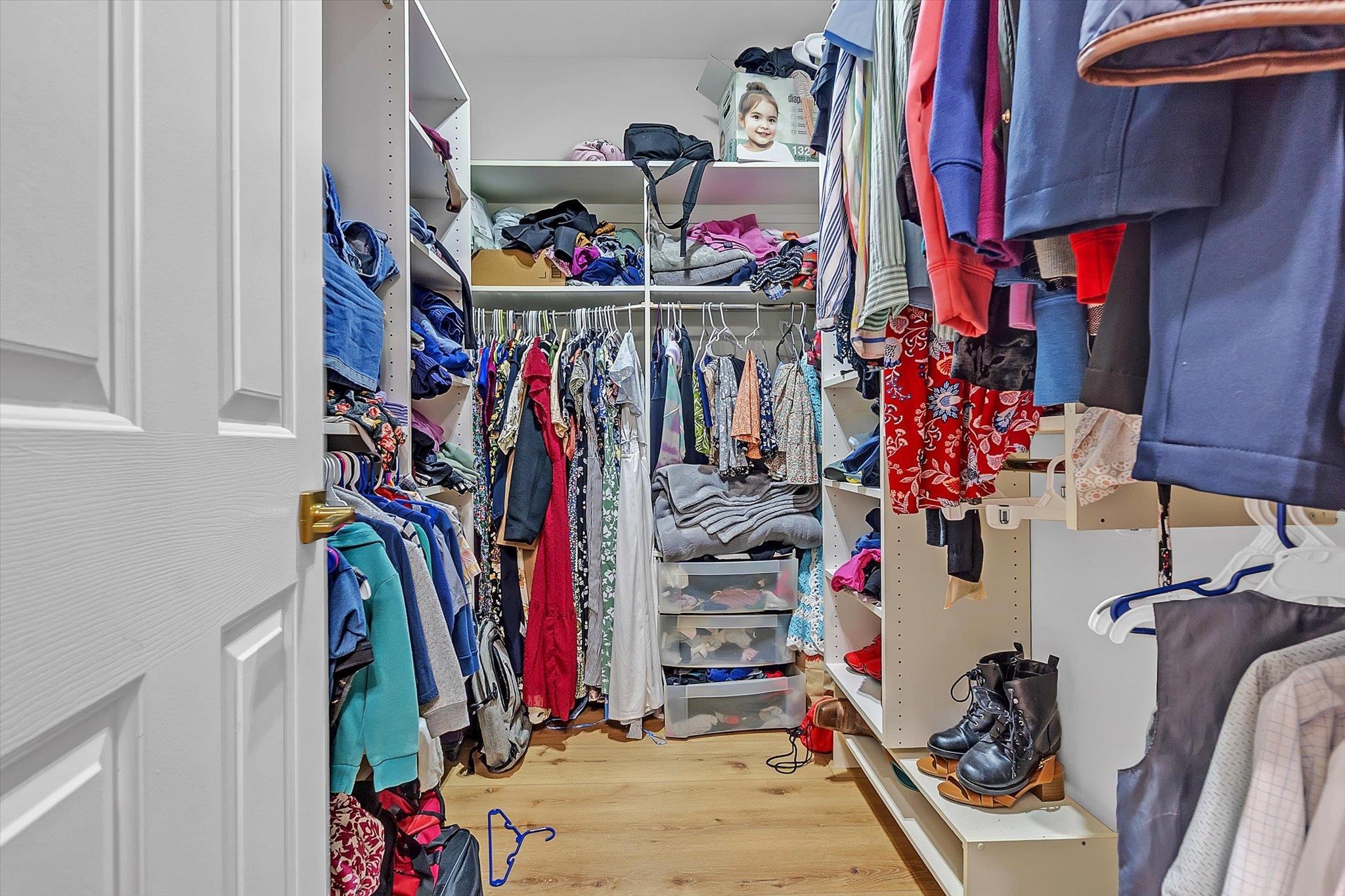 8786 Stablemill Lane Memphis, TN 38016 - Photo 12 of 40 a view of walk in closet with clothes