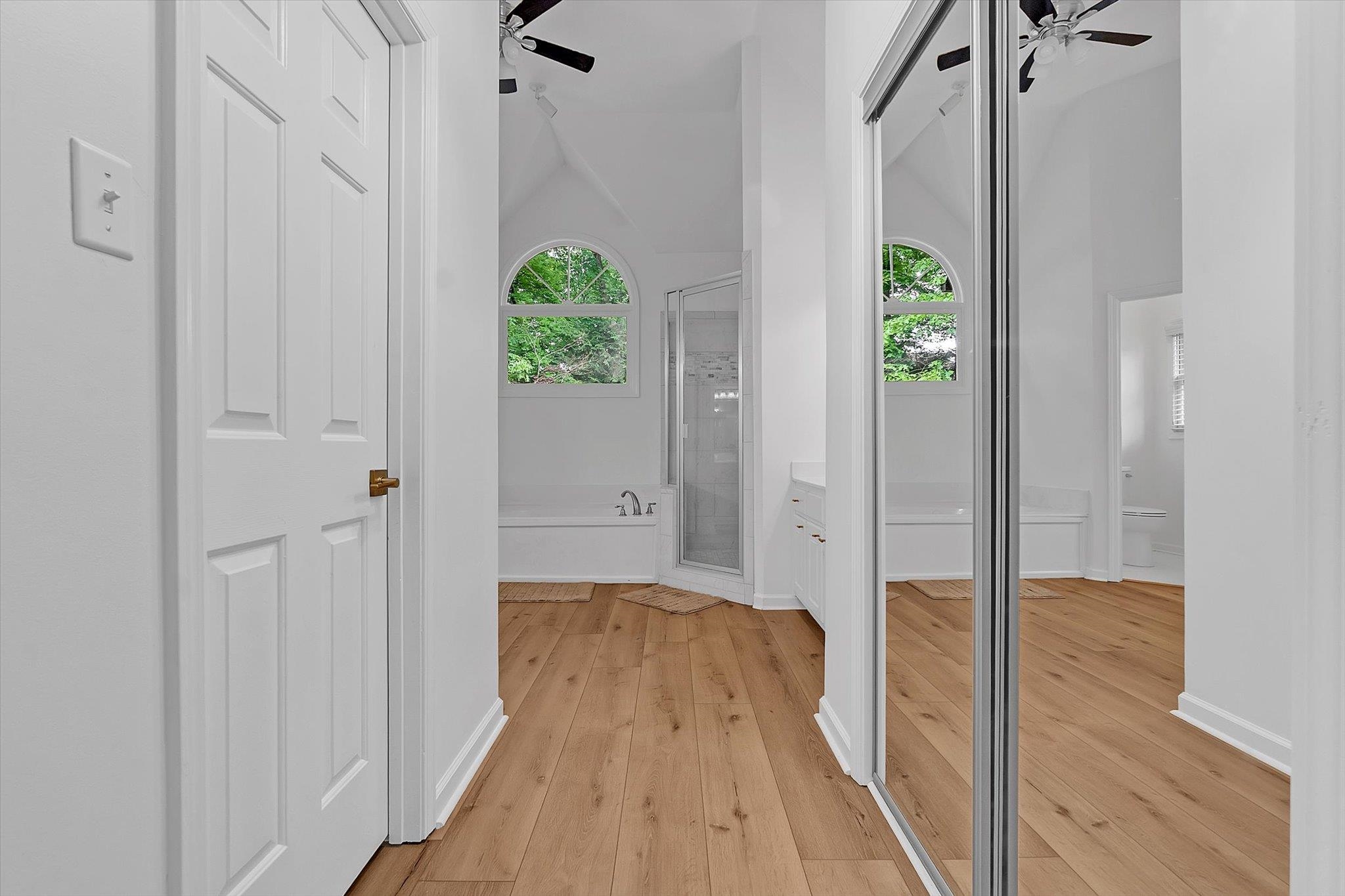 8786 Stablemill Lane Memphis, TN 38016 - Photo 16 of 40 a view of hallway with wooden floor