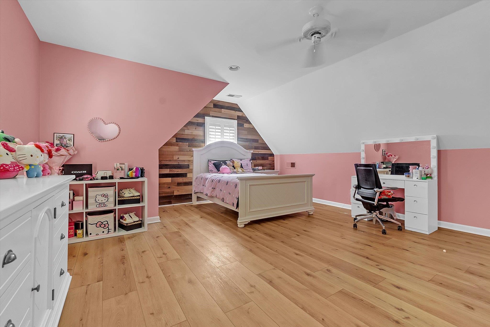 8786 Stablemill Lane Memphis, TN 38016 - Photo 35 of 40 a living room with furniture and a wooden floor