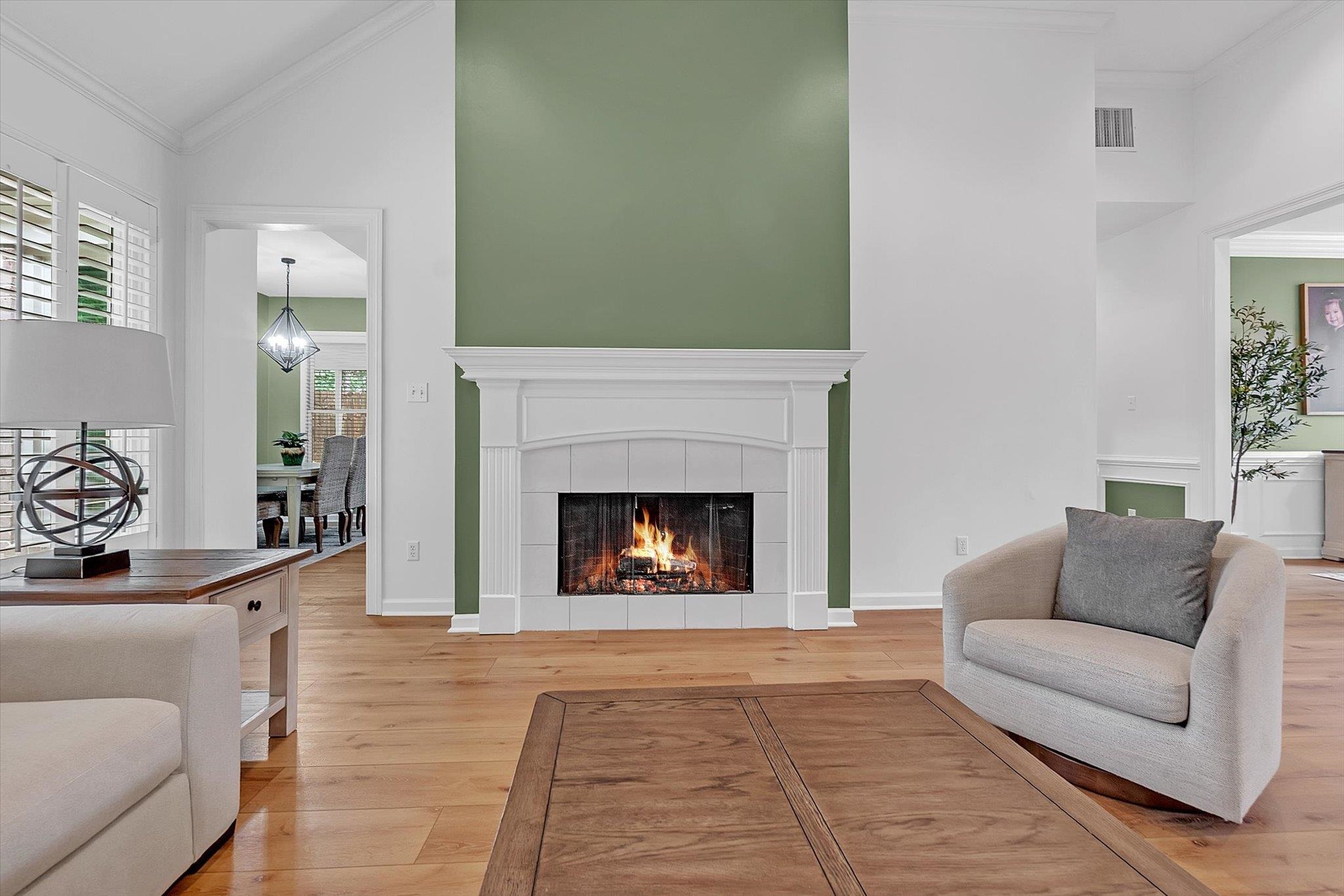 8786 Stablemill Lane Memphis, TN 38016 - Photo 7 of 40 a living room with furniture and a fireplace