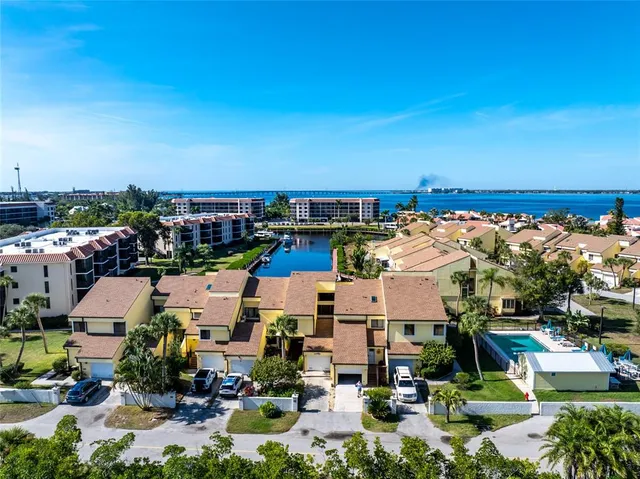 a view of residential houses with outdoor space