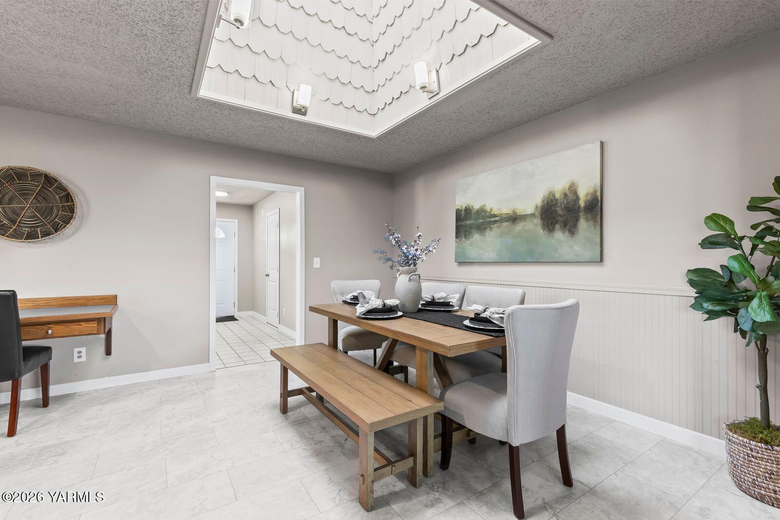 2030 Sunset Way Cowiche, WA 98923 - Photo 14 of 57 a view of a dining room with furniture window and wooden floor