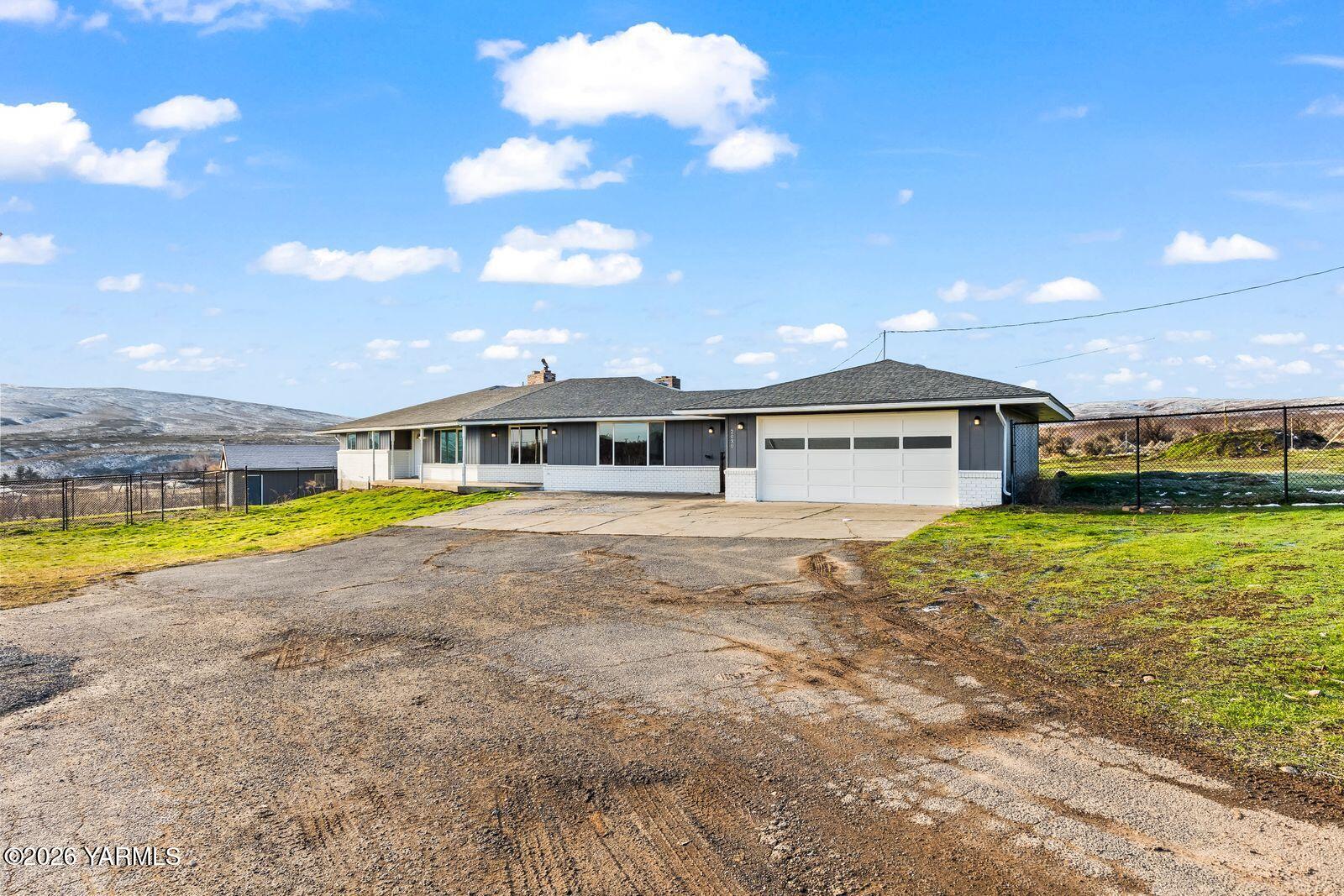 2030 Sunset Way Cowiche, WA 98923 - Photo 3 of 57 a view of a house with a swimming pool and a yard