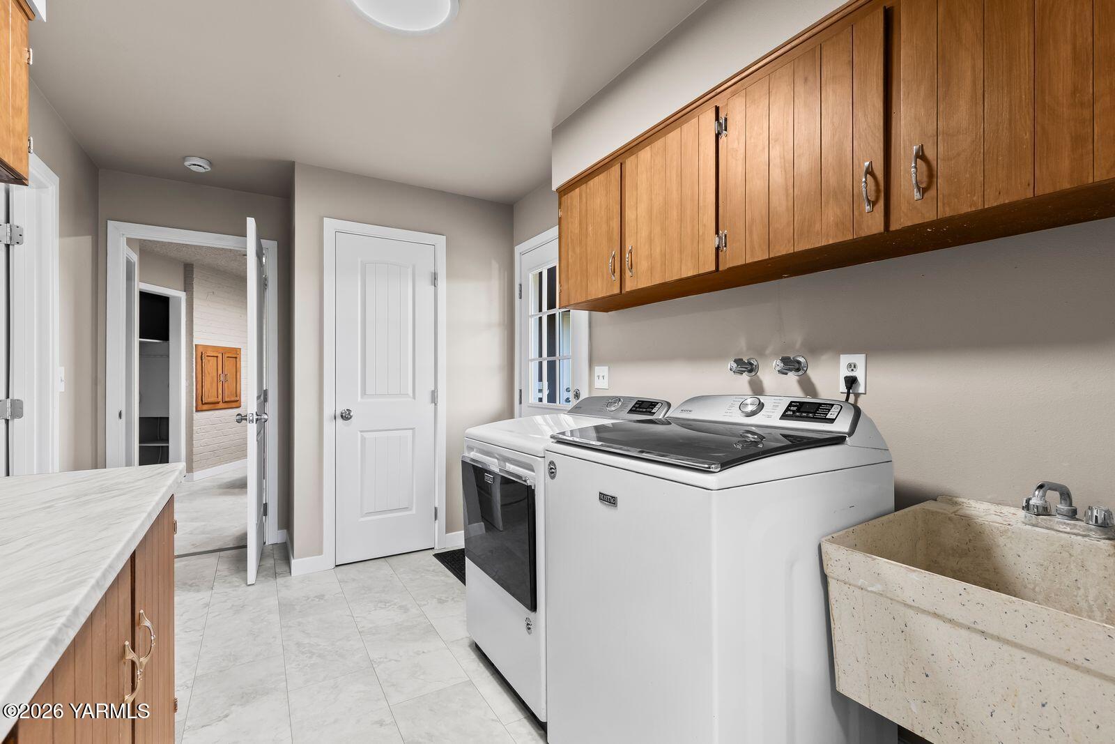 2030 Sunset Way Cowiche, WA 98923 - Photo 32 of 57 a kitchen with a sink stove and cabinets