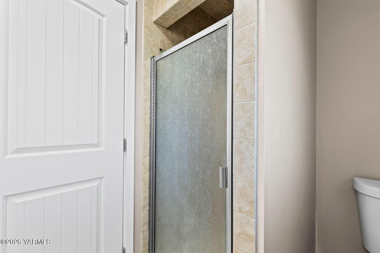 2030 Sunset Way Cowiche, WA 98923 - Photo 34 of 57 a bathroom with a glass shower door