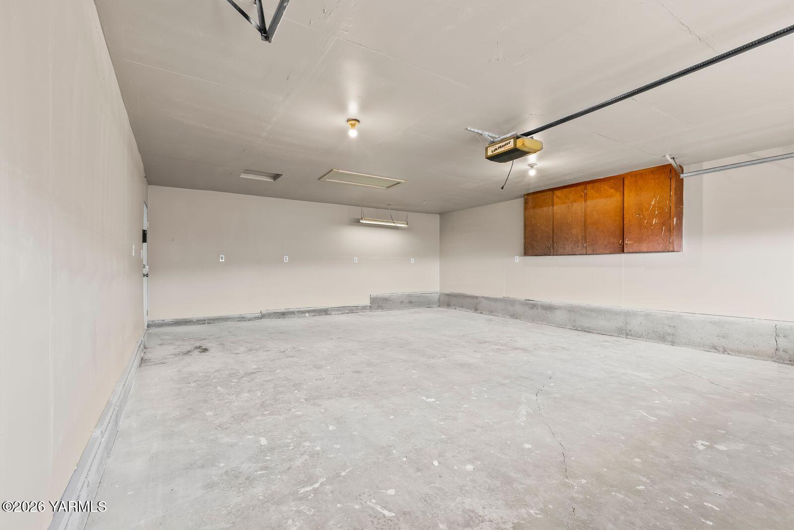 2030 Sunset Way Cowiche, WA 98923 - Photo 36 of 57 an empty room with windows and wooden walls