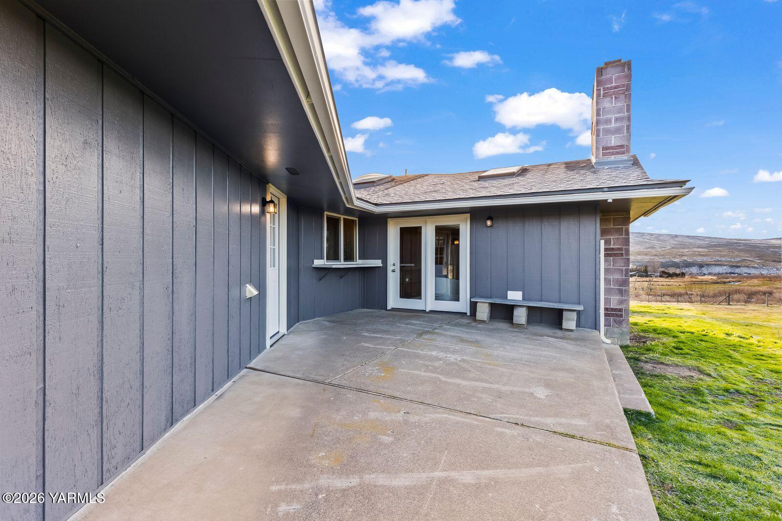 2030 Sunset Way Cowiche, WA 98923 - Photo 37 of 57 a view of a house with a patio and a yard