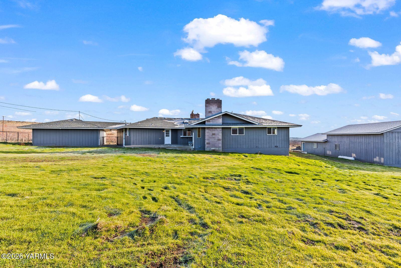 2030 Sunset Way Cowiche, WA 98923 - Photo 38 of 57 a swimming pool with outdoor seating and yard
