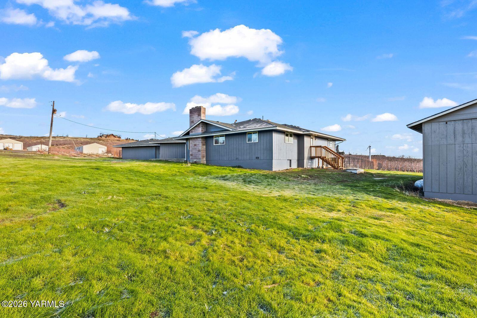 2030 Sunset Way Cowiche, WA 98923 - Photo 40 of 57 a view of a house with a yard