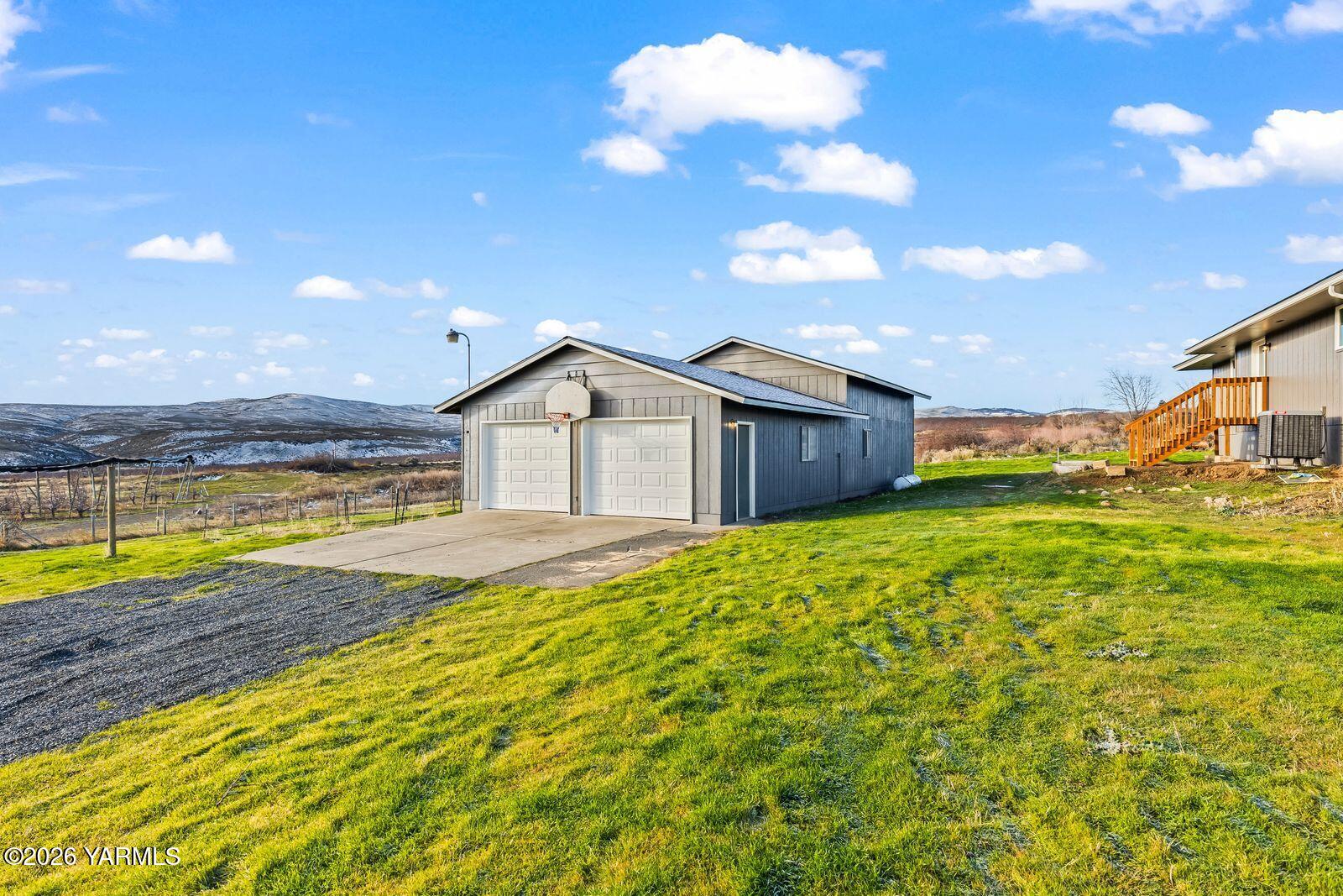 2030 Sunset Way Cowiche, WA 98923 - Photo 41 of 57 a view of a house with a swimming pool