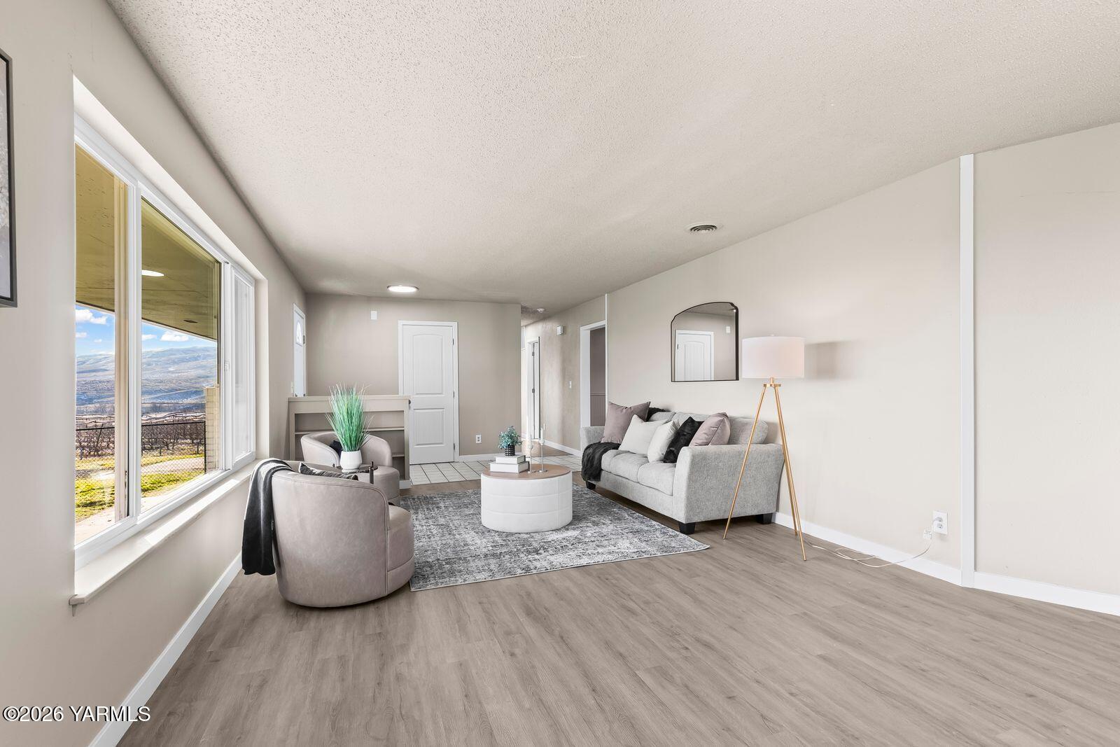 2030 Sunset Way Cowiche, WA 98923 - Photo 7 of 57 a living room with furniture and wooden floor