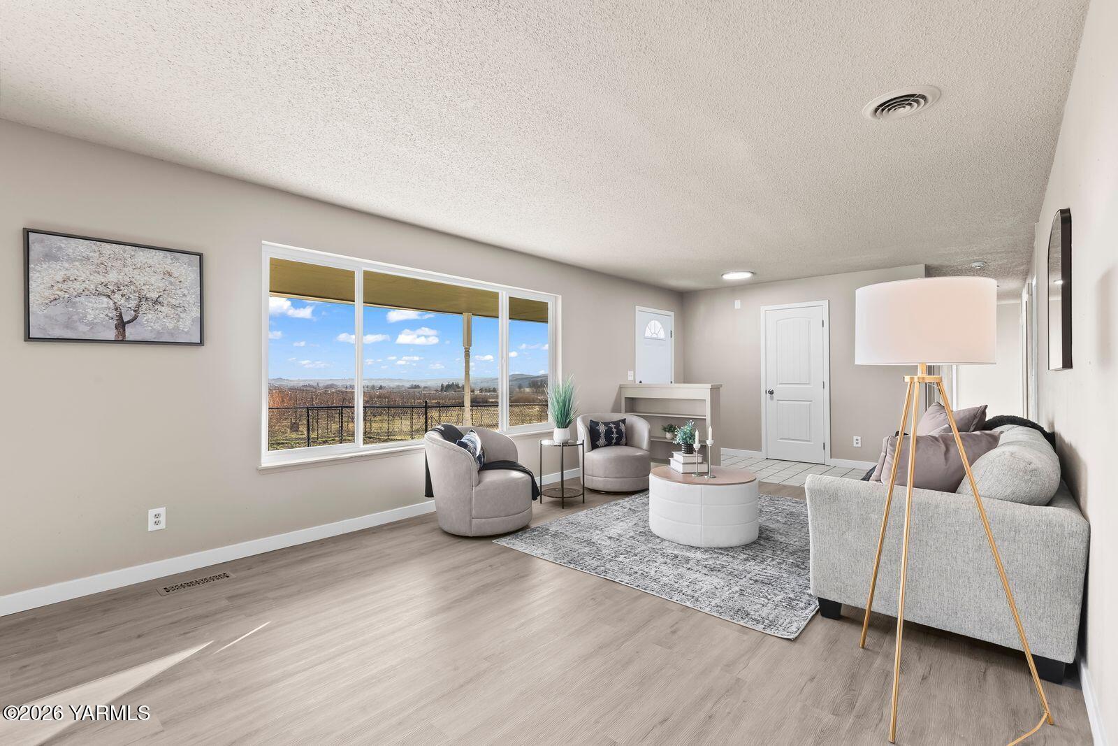 2030 Sunset Way Cowiche, WA 98923 - Photo 8 of 57 a living room with furniture and a large window
