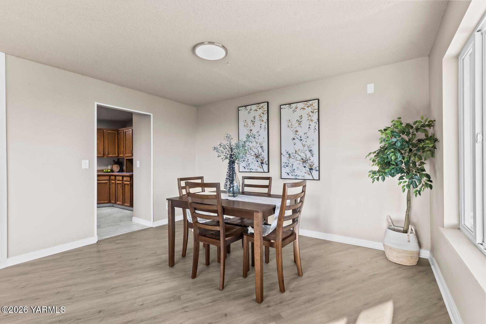 2030 Sunset Way Cowiche, WA 98923 - Photo 10 of 57 a view of a dining room with furniture and window