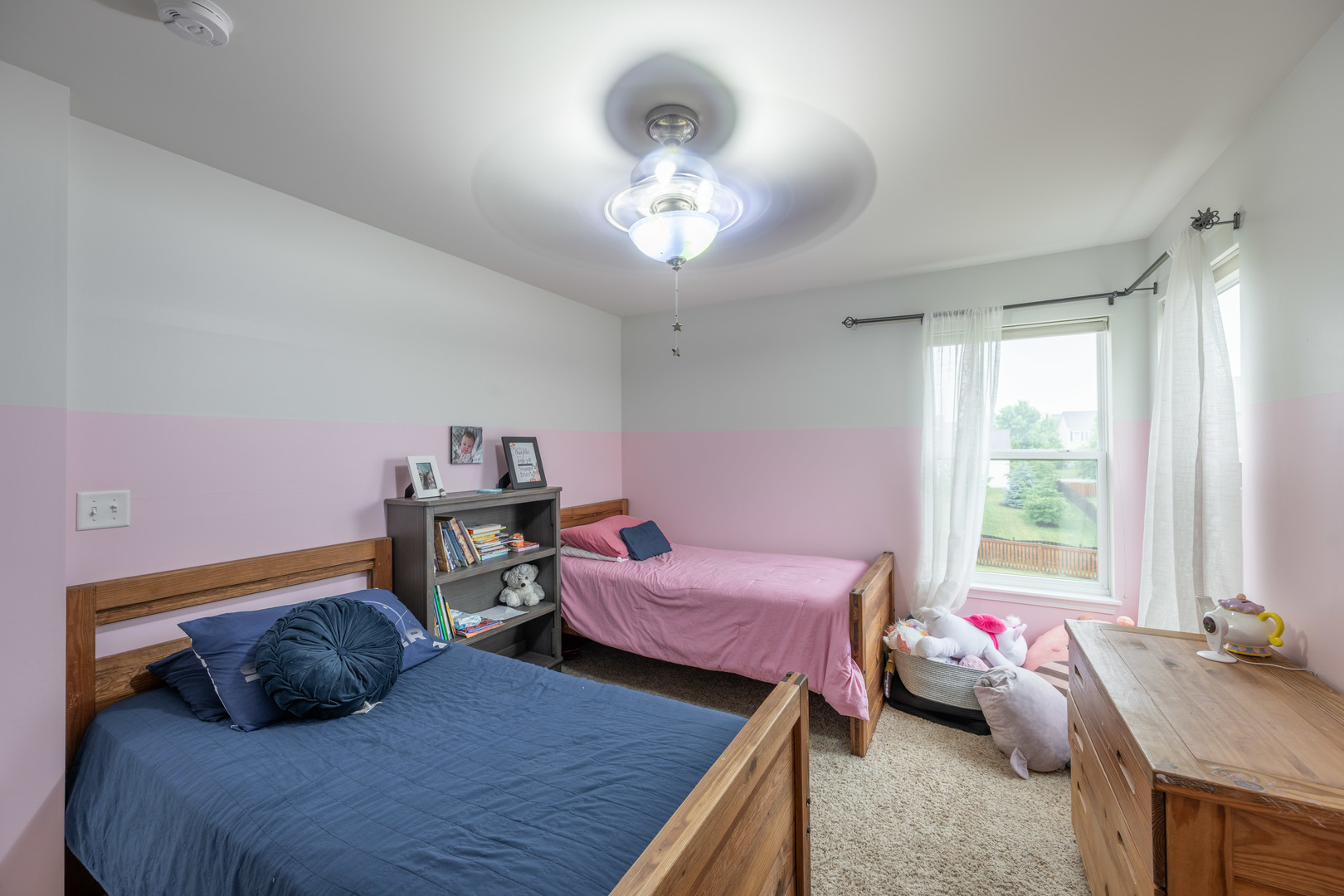 4333 Schofield Drive Oswego, IL 60543 - Photo 11 of 14 a bedroom with a bed and window