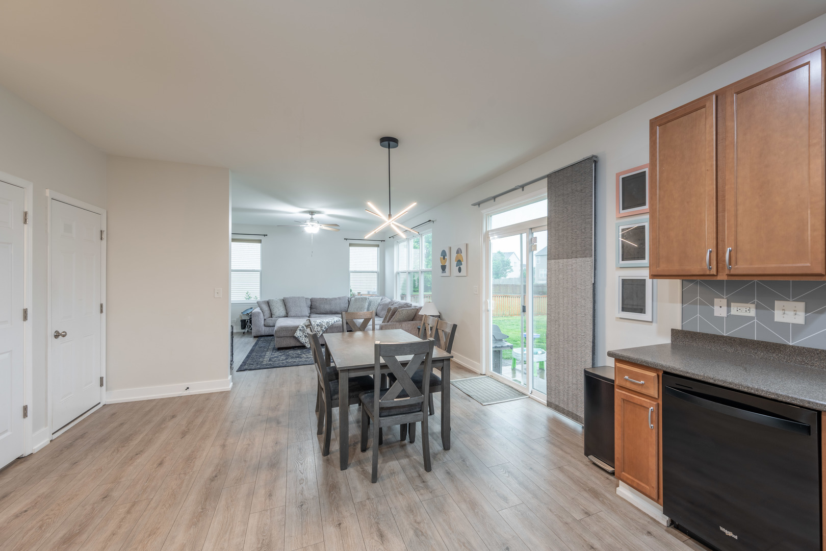 4333 Schofield Drive Oswego, IL 60543 - Photo 4 of 14 a view of a dining room with furniture window and wooden floor