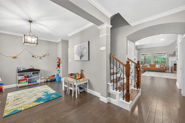 a view of livingroom with furniture and toys
