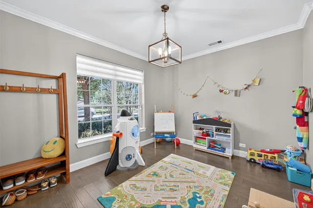 a room with furniture and a window