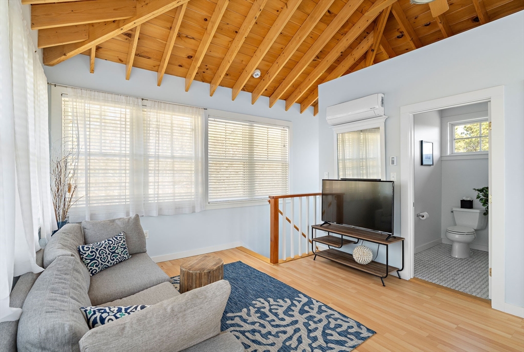 13 Young Street Edgartown, MA 02539 - Photo 13 of 29 a living room with furniture and a flat screen tv